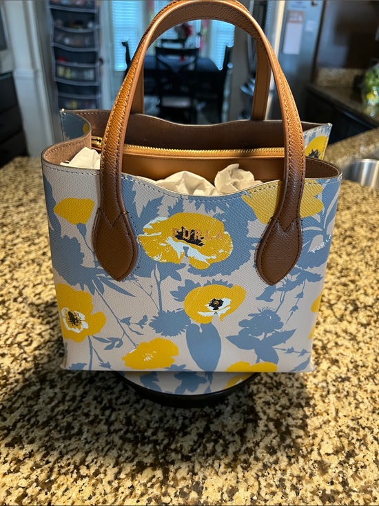 Furla Handbags - Furla Beige Tote with Yellow Floral Print and Brown Handles EUC